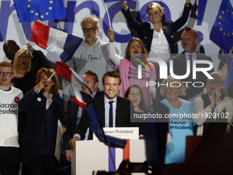 French presidential election candidate for the En Marche ! movement, Emmanuel Macron (C) reacts during a campaign rally in Arras, northern F...