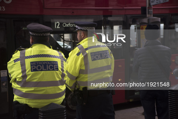 Two British police officers stands control in the Whitehall area of London, U.K., on Thursday, April 27, 2017. A man was arrested on suspici...
