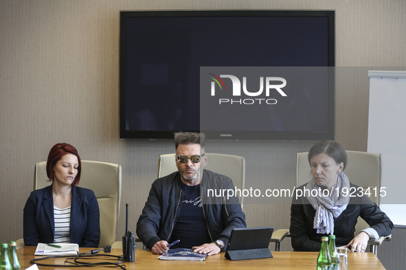 'Detective' Krzysztof Rutkowski  accompanied by two mothers during a press conference about two Krakow's Courts judgments that took away chi...