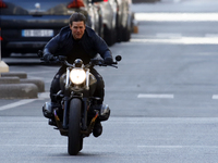 Actor Tom Cruise is seen riding a BMW bike on the set of 'Mission Impossible 6 Gemini' on Avenue de l'Opera on April 30, 2017 in Paris, Fran...