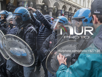 Riot police stand guard near Via Roma in the center city  to prevent protesters to defy a ban to celebrate May Day with cities authorities i...