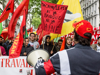 Protesters march during the annual May Day workers' rally in Lyon, east-central France, on May 1, 2017. (
