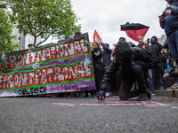 Protesters march during the annual May Day workers' rally in Lyon, east-central France, on May 1, 2017. (