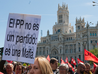 Workers, organized by labor unions and other labor organization take part in a rally to mark May Day, International Workers' Day in Madrid,...
