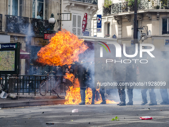 Demonstrators confront police on the annual May Day worker's march on May 1, 2017 in Paris, France. Police dealt with violent scenes in cent...