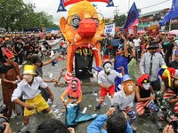 Quezon City, Philippines - Militant groups have a stage performance with an effigy of President Benigno Aquino III during the President's St...