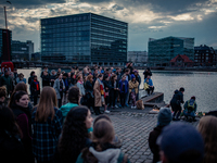 In Copenhagen, people gathered on Sunday 7 May to light candles for the two American victims of a deadly jetski accident- A fatal boating ac...