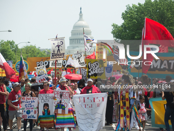 Over 200,000 people from union members to Natives took to the streets of  Washington, D.C. on April 29, 2017 for the Climate March.  (