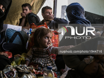 A family fleeing Mosul rests in a civilian collection center as fighting between Iraqi forces and the Islamic State intensifies on May 8th,...