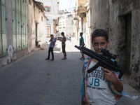 5-	Outside the church, and a few miles away from the Gaza frontline, children where playing with realistic-manufactured toy guns given to th...