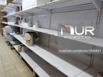 Empty shelves of medicines  in Shifa Hospital  in Gaza, Palestine, on 11 May 2017. The Ministry of Health in Gaza appeals for the shortage o...