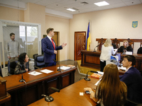 Rafael Lusvarghi (L) lawyer Valentyn Rybin (C) has a speech during the trial in Kyiv, Ukraine, May 11, 2017. Appeal court of Kyiv hears the...