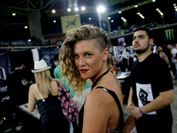 Young woman at the Athens International Tatoo Convention, at the Olympic Tae Kwon Do Centre, on Saturday May 13, 2017. The visitors of the f...
