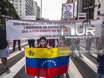 Venezuelans living in Brazil, protest against Venezuelan President Nicolás Maduro on Avenida Paulista in Sao Paulo, Brazil, on Saturday 13 M...