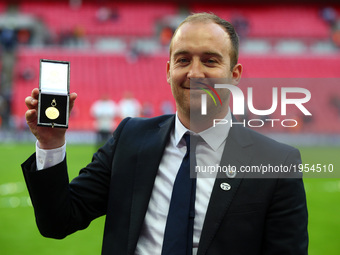Nick Cushing manager of Manchester City Women FA Women's Cup-Final winners medal
during The SSE FA Women's Cup-Final match betweenBirmingham...