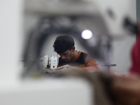Garments worker working inside a factory in Gazipur in Bangladesh, on May 14, 2017.Bangladesh is the second largest apparel exporter in the...