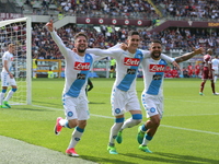 Jos Callejon (center) celebrates after scoring with Lorenzo Insigne (right) and Dries Mertens (left) during the Serie A football match betwe...