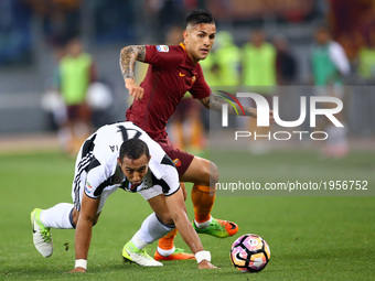 Mehdi Benatia of Juventus and Leandro Paredes of Roma during the Serie A match between AS Roma and Juventus FC at Stadio Olimpico on May 14,...