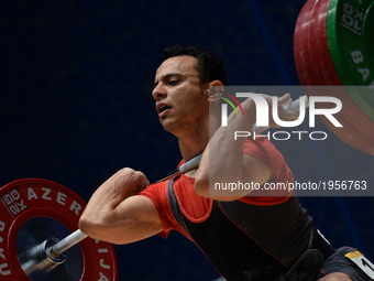 Ahmed Saad of Egypt competes in Men's 62kg Weightlifting final during day three of Baku 2017 - 4th Islamic Solidarity Games at Weightlifting...