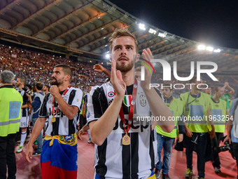 Miralem Pjianic celebrates after winning the TIM Cup Final match against SS Lazio during the Tim Cup football match F.C. Juventus vs S.S. La...