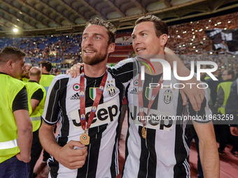 Claudio  Marchisio, Stephan Lichtsteiner celebrates after winning the TIM Cup Final match against SS Lazio during the Tim Cup football match...