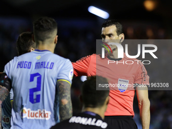  Juan Martinez Munuera talks with  Hugo Mallo defender of Celta de Vigo (2) during the La Liga Santander match between Celta de Vigo and Rea...