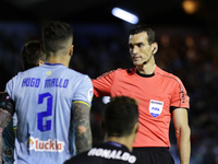  Juan Martinez Munuera talks with  Hugo Mallo defender of Celta de Vigo (2) during the La Liga Santander match between Celta de Vigo and Rea...