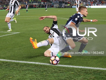 Giorgio Chiellini (Juventus FC) and Ciro Immobile (SS Lazio) compete for the ball during the Italian Cup final between Juventus FC and SS La...