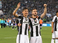 Paulo Dybala (left) and Miralem Pjanic (right)  celebrate the victory of Juventus after the Italian Cup final between Juventus FC and SS Laz...