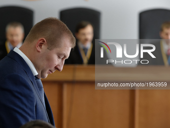 Viktor Yanukovych (not present) defender Vitalii Serdyuk (L) has a speech during the court hearing. Obolon district court of Kyiv continues...