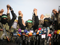 Members of various Palestinian armed groups hold a press conference in support of Palestinian prisoners on hunger strike in Israeli jails, i...