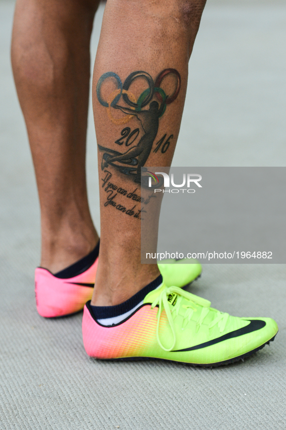 A tatoo 'If you can dream it, You can do it... 2016' seen on Turkish sprinter Izzet Safer's leg of Turkey participating in Men's 200m final,...