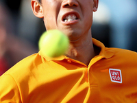 Kei Nishikori of Japan in action during the men's third round match against Juan Martin Del Potro of Argentina on Day Five of the Internazio...