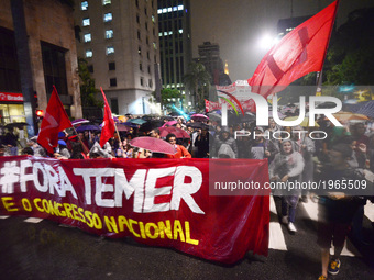 People protest against the president of Brasil, Michael Temer, at the Paulista avenue, at Sao Paulo, Brazil, on 18 My 2017. Temer was record...