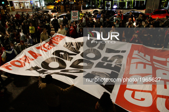 Protestors protest on Avenida Paulista, central region of Sao Paulo, Brazil, against the government of President Michel Temer, on May 18, 20...