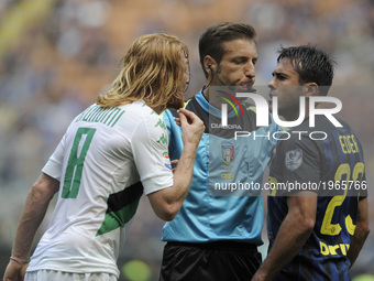 Davide Biondini of Sassuolo player, Davide Massa the referee and Eder of Inter player during the Serie A match between FC Internazionale and...