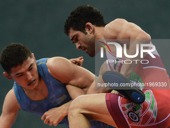 Raxmatulla Muslimov Murtazali of Azerbaijan competes against Zafer Dama of Turkey in the Mens Freestyle Wrestling 70kg semi-finals during Ba...