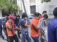 Police on 20 May 2017 take four suspected members of LGBT community in Dhaka.  A Dhaka court on Saturday placed four suspected members of LG...
