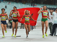 Morocco team celebrate after taking the third place in Women's 4 x 400 Relay final, during day five of Athletics at Baku 2017 - 4th Islamic...