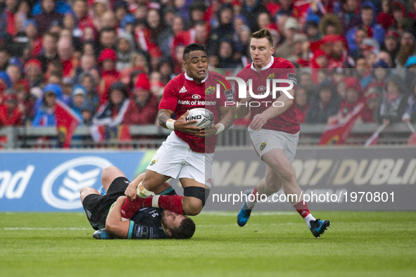 Francis Saili of Munster tackled by Nicky Smith of Ospreys during the Guinness PRO12 Semi-Final match between Munster Rugby and Ospreys at T...