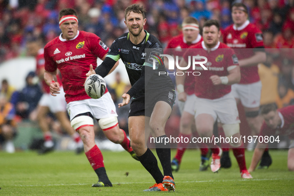 Ashley Beck of Ospreys with the ball during the Guinness PRO12 Semi-Final match between Munster Rugby and Ospreys at Thomond Park Stadium in...