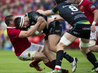 Tommy O'Donnell of Munster tackled by Scott Baldwin of Ospreys during the Guinness PRO12 Semi-Final match between Munster Rugby and Ospreys...