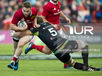 Rory Scannell of Munster tackled by Alun Wyn Jones of Ospreys during the Guinness PRO12 Semi-Final match between Munster Rugby and Ospreys a...