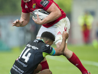 Tommy O'Donnell of Munster tackled by Keelan Giles of Ospreys during the Guinness PRO12 Semi-Final match between Munster Rugby and Ospreys a...