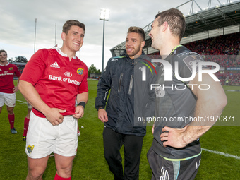 Ian Keatley of Munster talks with Rhys Webb and Tom Habberfield of Ospreys after the Guinness PRO12 Semi-Final match between Munster Rugby a...