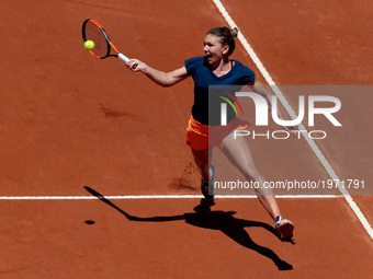 Simona Halep of Romania hits a return to Elina Svitolina of Ukraine during the WTA Tennis Open final at the Foro Italico, on May 21, 2017 in...