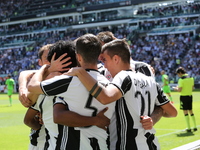 Juventus players celebrates afters the first gol of Mario Mandzukic during the Serie A football match between Juventus FC and FC Crotone at...