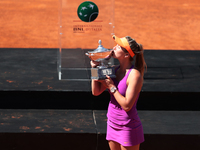 Elina Svitolina of Ukraine kiss the trophy after winning the WTA Singles Final match against Simona Halep of Roumania during The Internazion...
