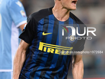 Marco Andreolli celebrates after scoring a goal 1-1- during the Italian Serie A football match between S.S. Lazio and F.C. Inter at the Olym...
