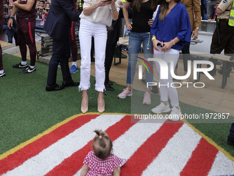 Carla Pereyra and  his daughter Francesca at the end of the La Liga match between Club Atletico de Madrid and Athletic Club Bilbao at Vicent...